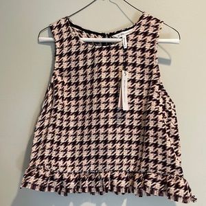 BCBGeneration multi color sleeveless blouse with hem detail